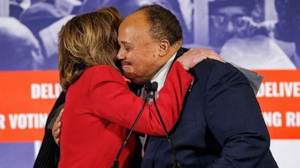 PHOTO: Martin Luther King III and Speaker of the House Nancy Pelosi embrace during a press conference at Union Station on Martin Luther King Jr. Day, Jan. 17, 2022, in Washington, D.C. (Samuel Corum/Getty Images)