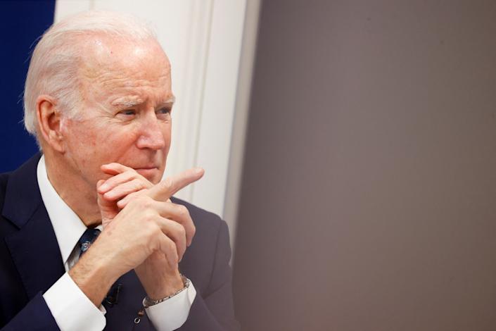 President Biden gestures during a video conference with farmers, ranchers and meat processors to discuss meat and poultry supply chain issues amid relatively high inflation, at the White House campus January 3, 2022. REUTERS/Jonathan Ernst