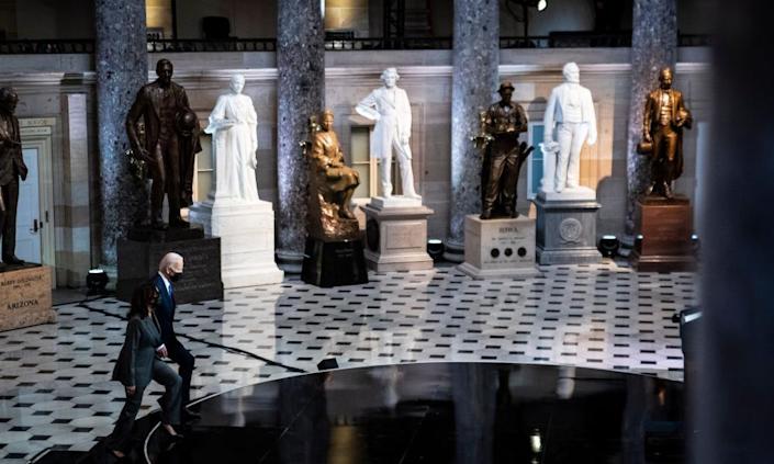 History looms large as Joe Biden and Kamala Harris in Statuary Hall to address the threat to American democracy.