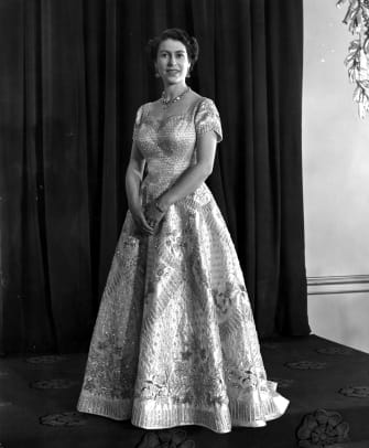 1_Queen Elizabeth II wearing a gown designed by Norman Hartnell for her Coronation ceremony. (Photo by Central Press:Getty Images)